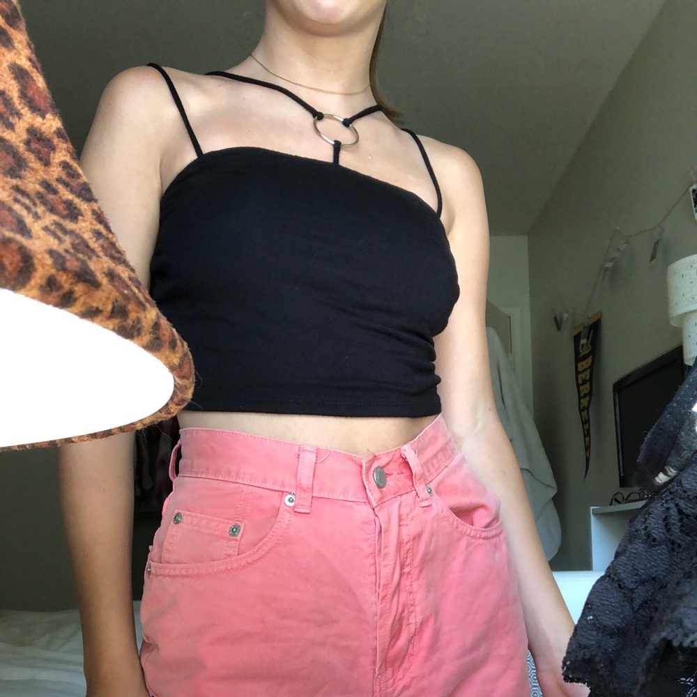 Her she black tank top.